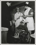 Nurses Preparing Young Patient for Moving Day