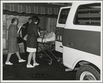 Loading Patient into Ambulance on Moving Day