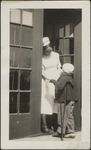 Nurse and Young Patient at Outer Door