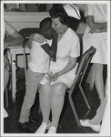 Nurse Comforting Upset Child